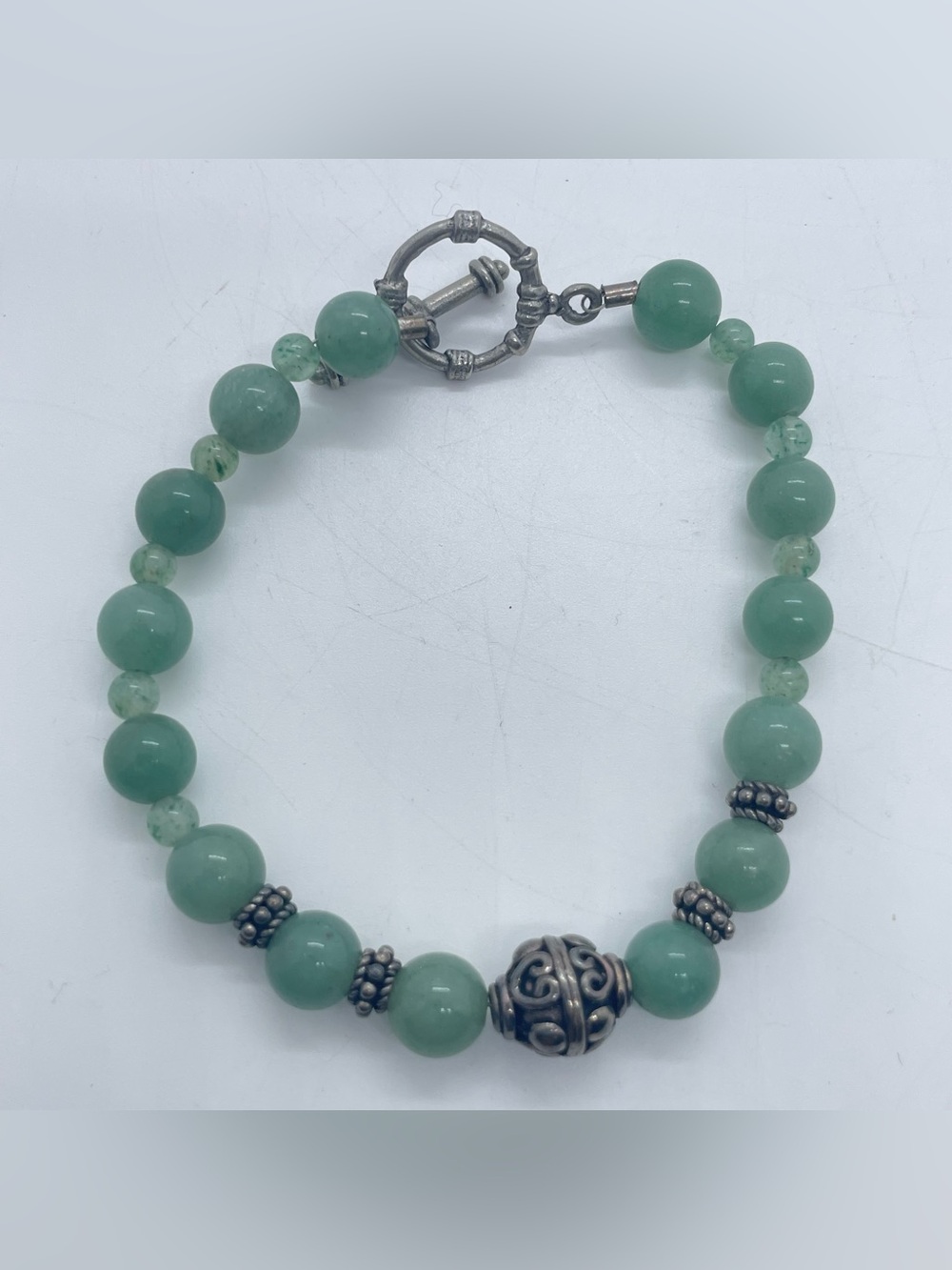 Green Stone Beaded Bracelet with Silver Tone Accents Toggle Closure